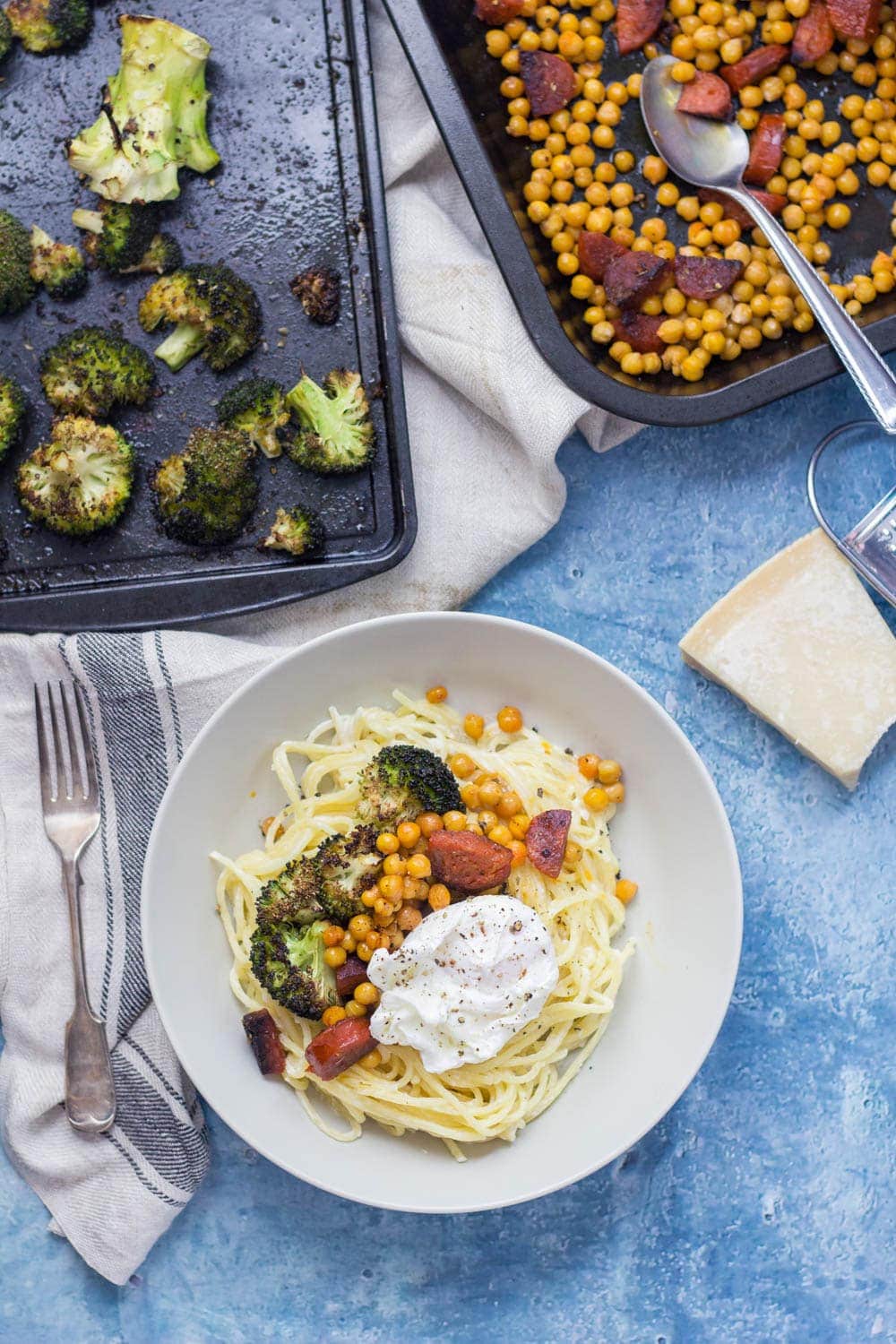 This garlic pasta is a simple weeknight meal packed with garlicky flavour and topped with delicious roasted broccoli, crispy chickpeas and chorizo. Finished with a poached egg.