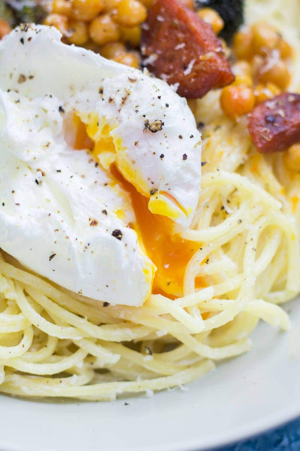 This garlic pasta is a simple weeknight meal packed with garlicky flavour and topped with delicious roasted broccoli, crispy chickpeas and chorizo. Finished with a poached egg.