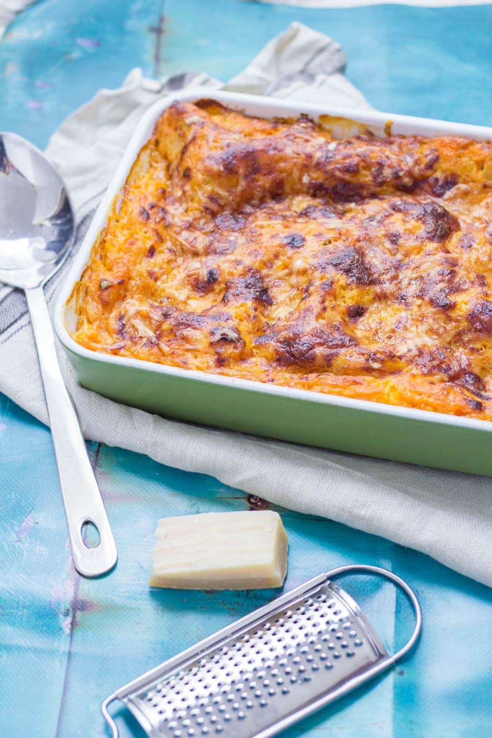 This vegetarian twist on a classic pasta dish is the perfect comfort food! This four cheese butternut squash lasagne is layered with spinach and mushrooms. #lasagne #lasagna #squash #pasta #dinner