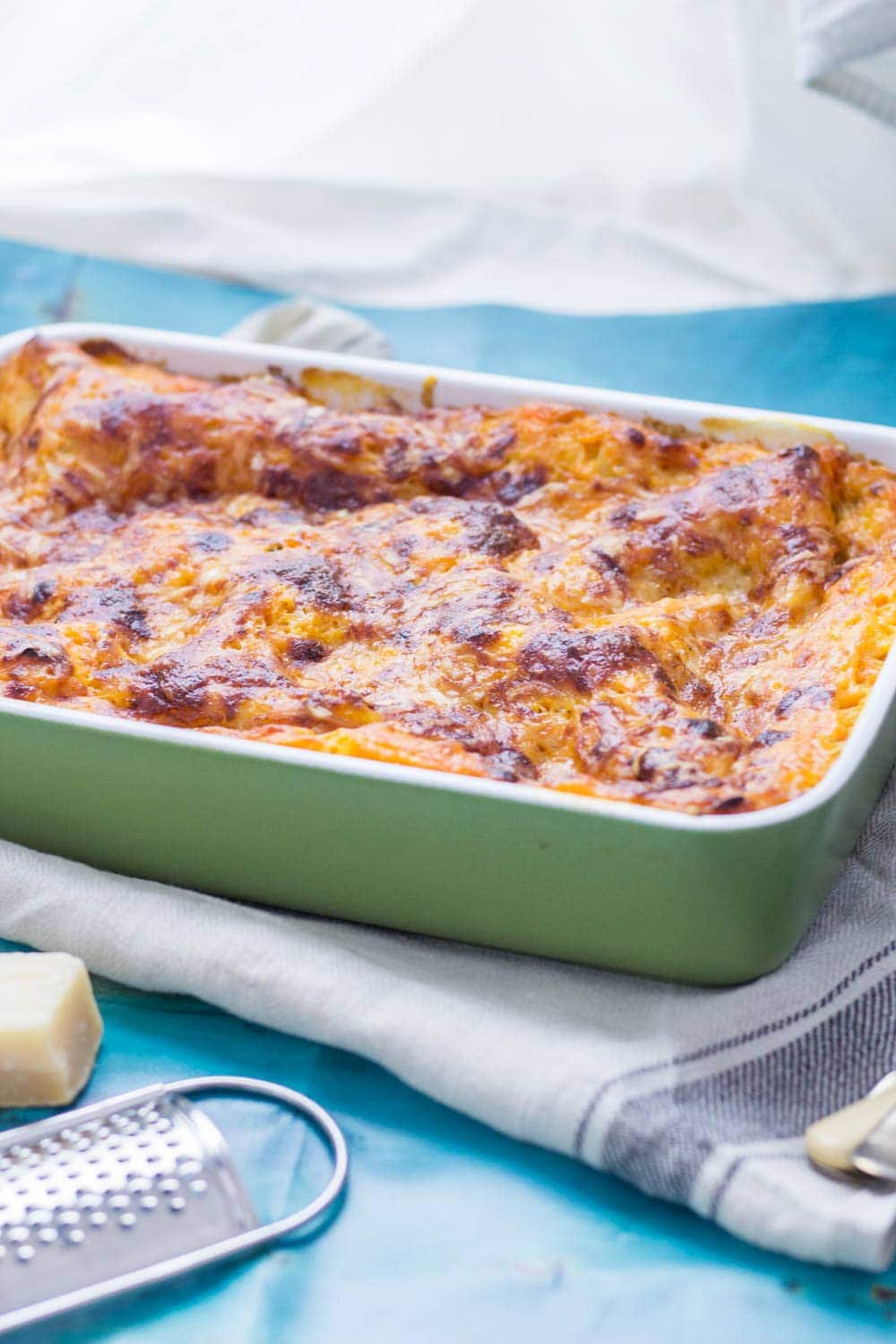 This vegetarian twist on a classic pasta dish is the perfect comfort food! This four cheese butternut squash lasagne is layered with spinach and mushrooms. #lasagne #lasagna #squash #pasta #dinner