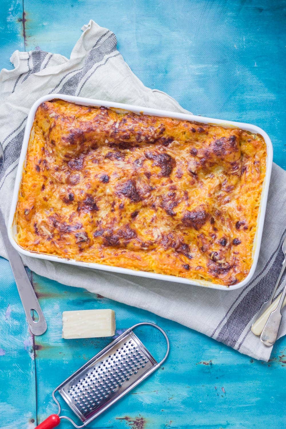 This vegetarian twist on a classic pasta dish is the perfect comfort food! This four cheese butternut squash lasagne is layered with spinach and mushrooms. #lasagne #lasagna #squash #pasta #dinner