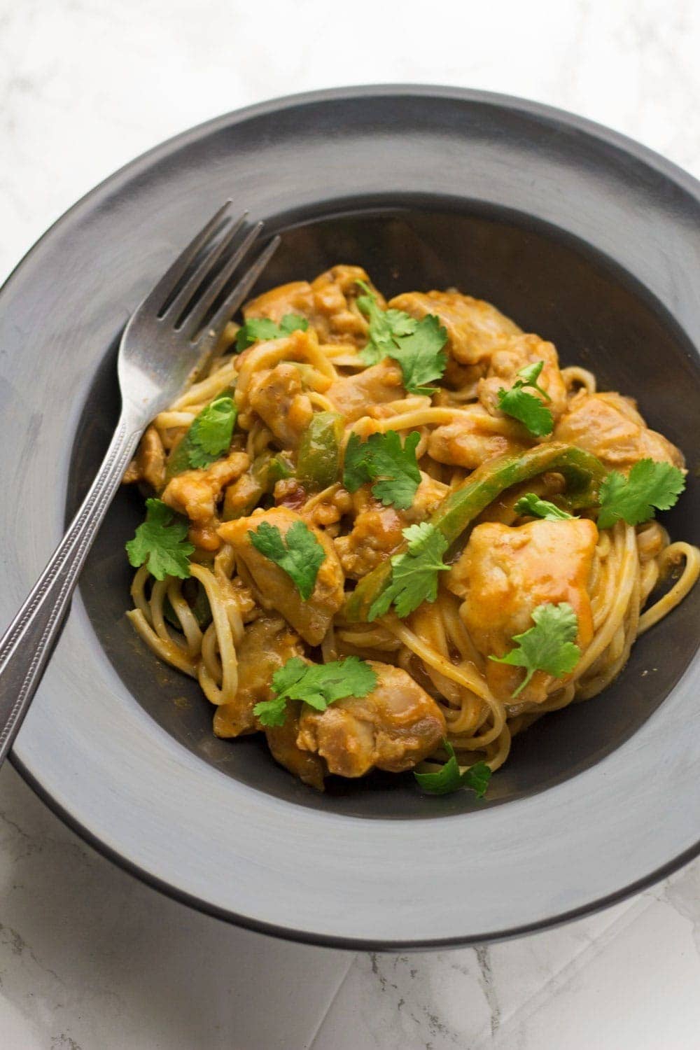 This peanut chicken is a quick weeknight recipe that tastes amazing. Serve over rice or noodles for an easy family dinner.