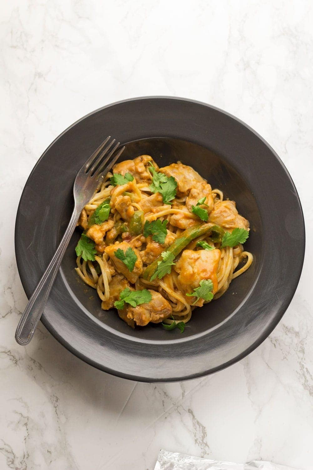 This peanut chicken is a quick weeknight recipe that tastes amazing. Serve over rice or noodles for an easy family dinner.