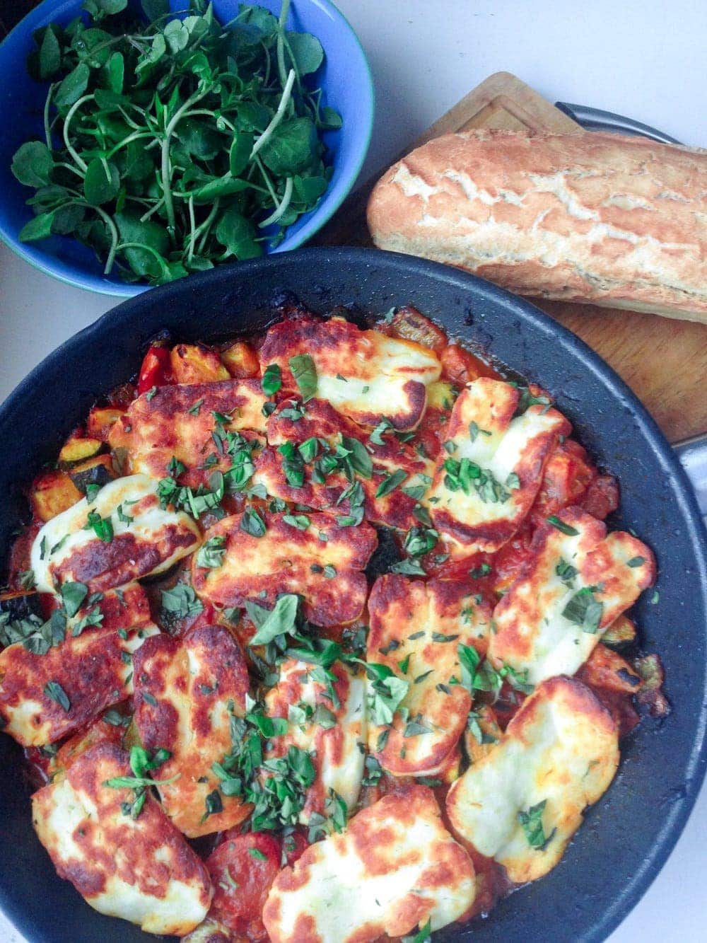 This halloumi bake perfectly combines the healthy freshness of vegetables with the chewy, salty halloumi for a delicious vegetarian dinner.