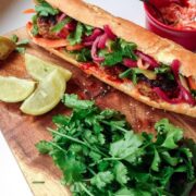 This Korean pork banh mi has meatballs cooked until crisp on the outside then topped with gochujang mayo, carrot, cucumber and quick pickled onions.