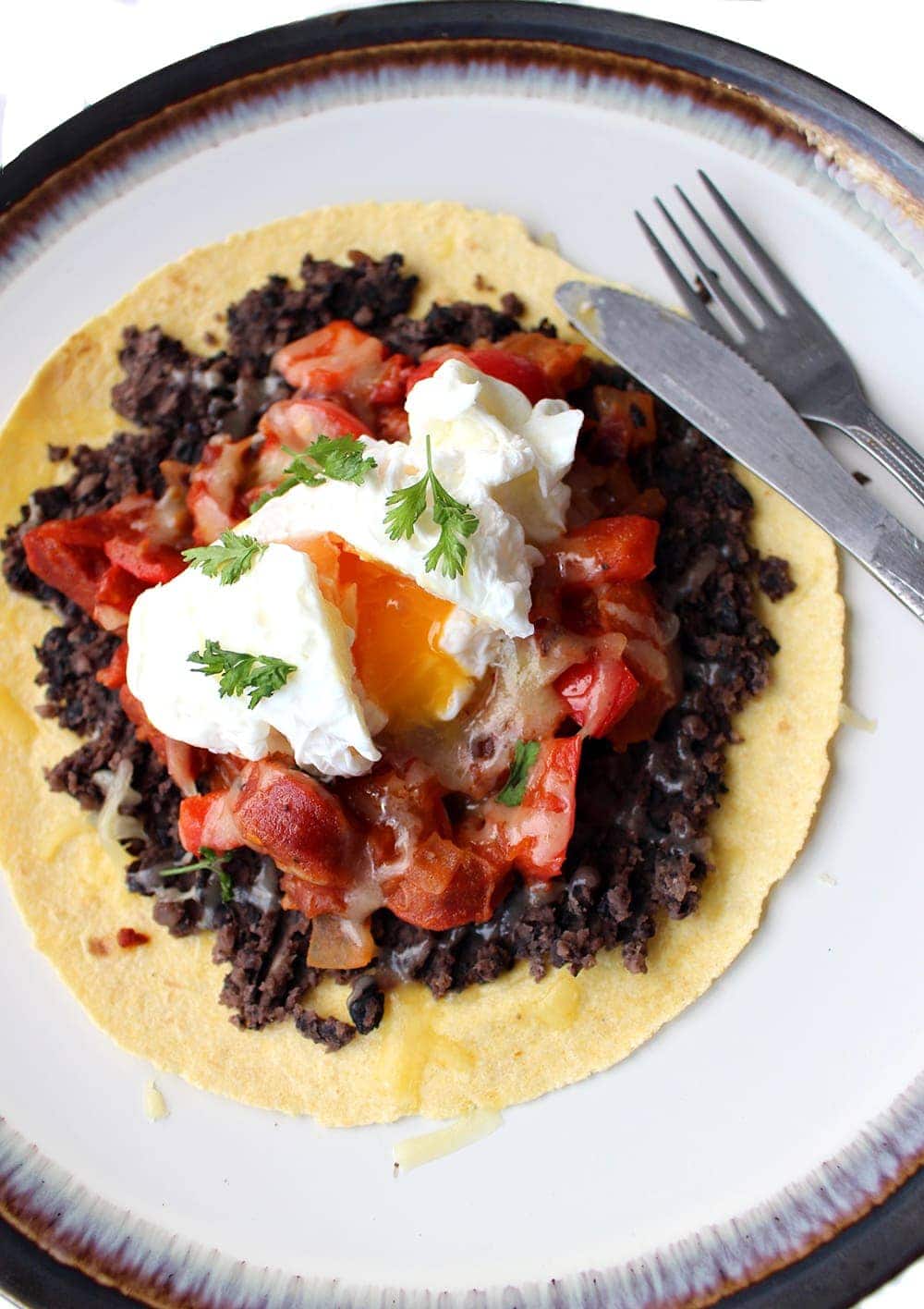 This chorizo huevos rancheros is a super easy breakfast which still feels like such a treat! It includes a super quick refried bean substitute and loads of flavour from the chorizo.