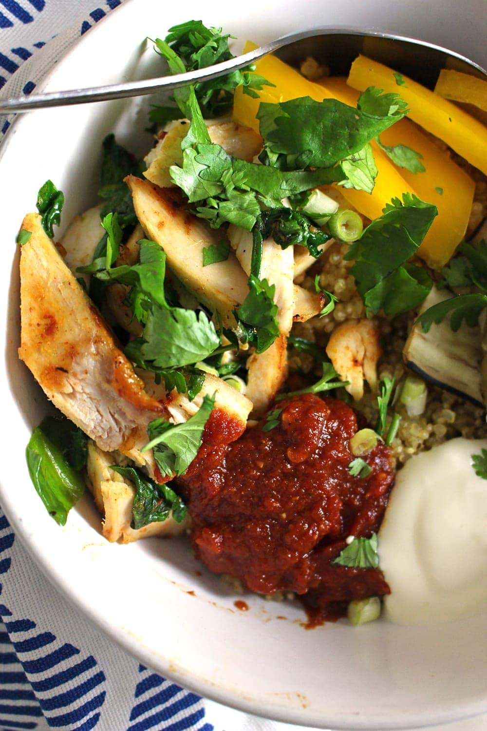 These chipotle chicken quinoa bowls are perfect for using up leftover roast chicken. A simple and healthy dinner, use any veg you have and make it your own.