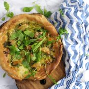 This rocket pesto chicken skillet pizza is a brilliant variation on a classic pizza. With a pesto base and a layer of mozzarella surrounding bits of chicken