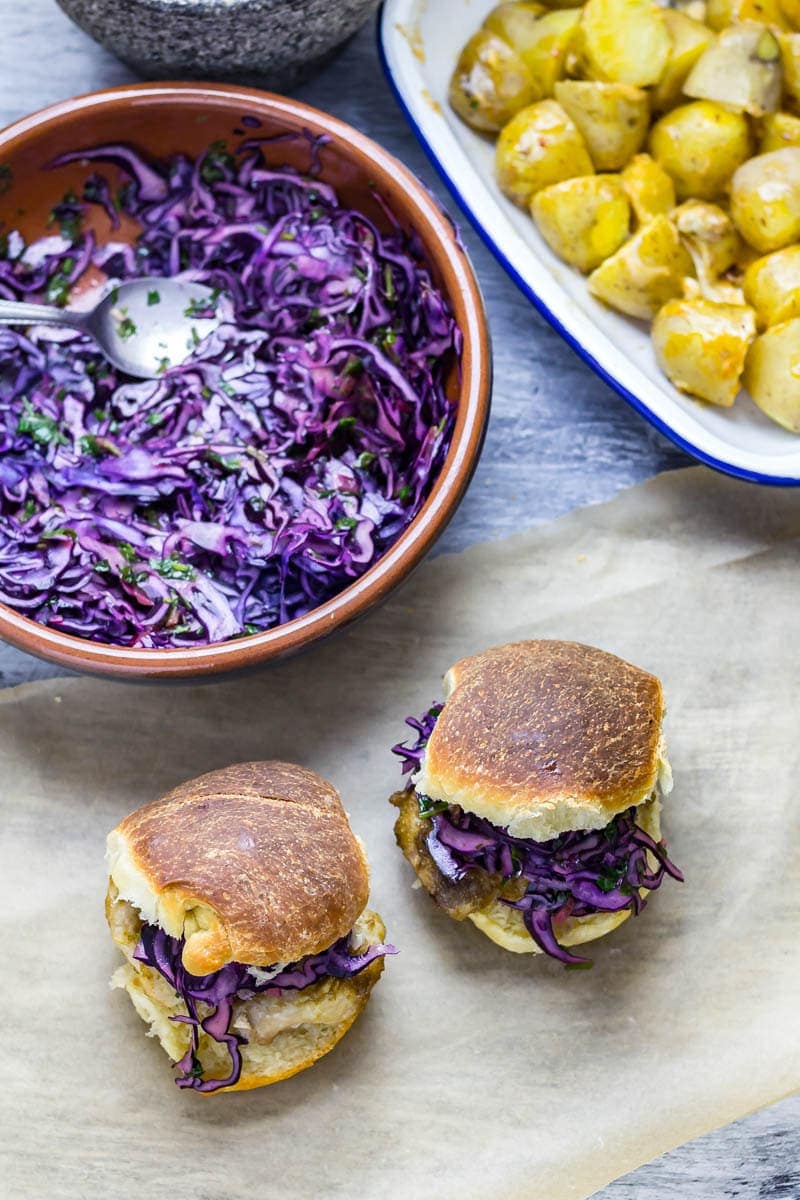 Cumin Rubbed Chicken Sandwich, Chimichurri Slaw & Chipotle Potato Salad. This cumin rubbed chicken sandwich is served with a delicious herby chimichurri slaw and a spicy chipotle potato salad! #chickensandwich #chicken #recipe 