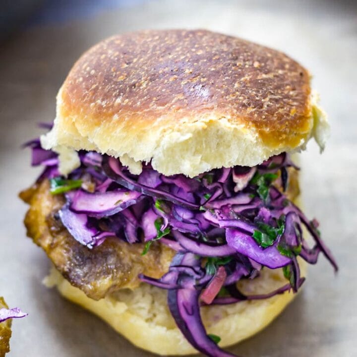 Cumin Rubbed Chicken Sandwich, Chimichurri Slaw & Chipotle Potato Salad. This cumin rubbed chicken sandwich is served with a delicious herby chimichurri slaw and a spicy chipotle potato salad! #chickensandwich #chicken #recipe