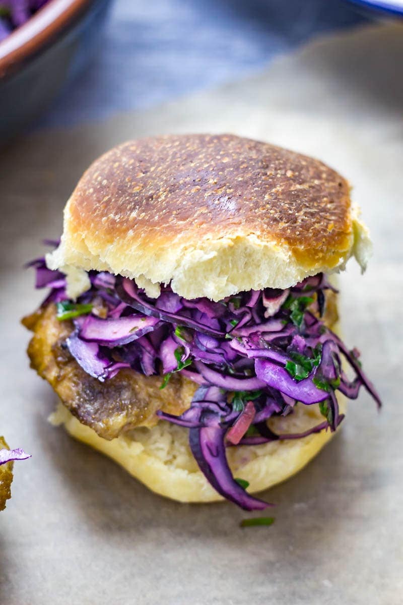 Cumin Rubbed Chicken Sandwich, Chimichurri Slaw & Chipotle Potato Salad. This cumin rubbed chicken sandwich is served with a delicious herby chimichurri slaw and a spicy chipotle potato salad! #chickensandwich #chicken #recipe