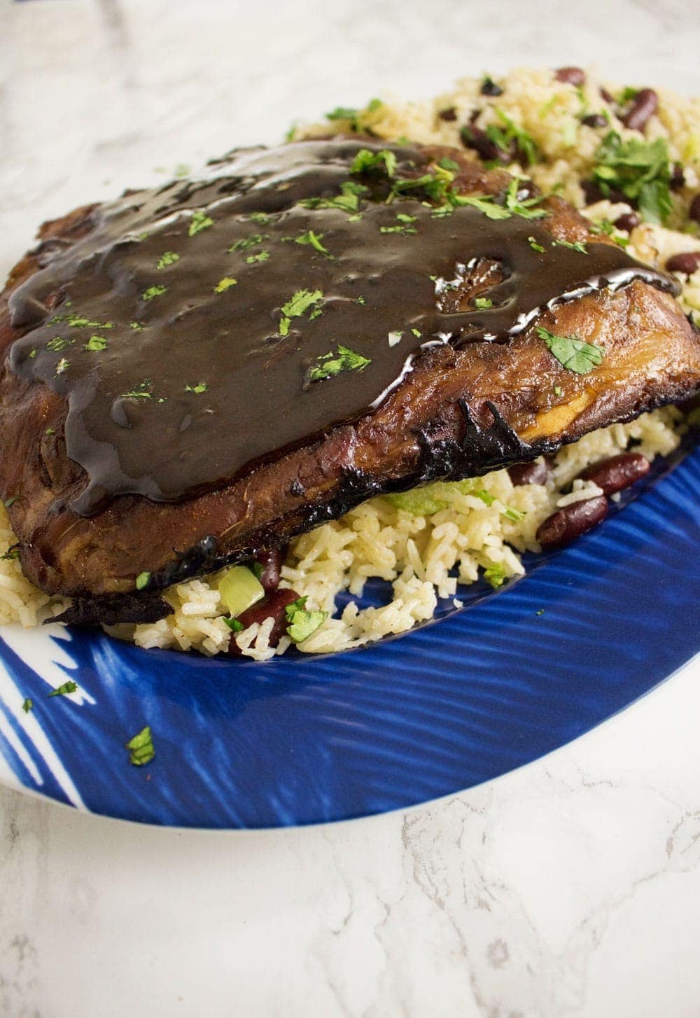 These sticky oven baked Cajun pork ribs are the perfect autumn dinner. Made with a brown sugar and spice dry rub and cooked in a flavourful braising liquid.