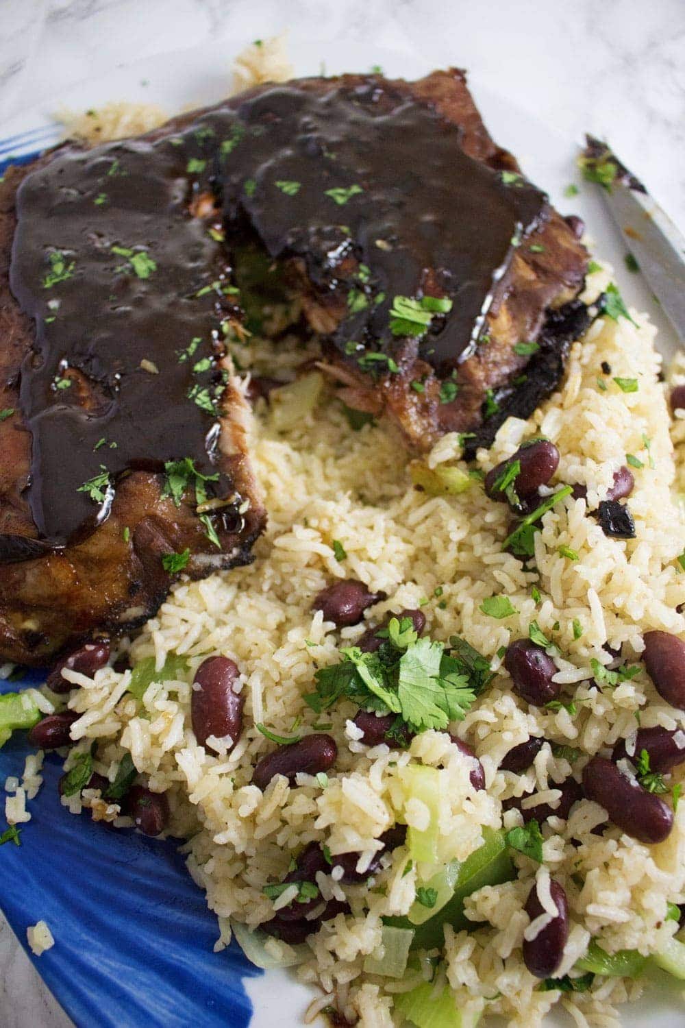 These sticky oven baked Cajun pork ribs are the perfect autumn dinner. Made with a brown sugar and spice dry rub and cooked in a flavourful braising liquid.