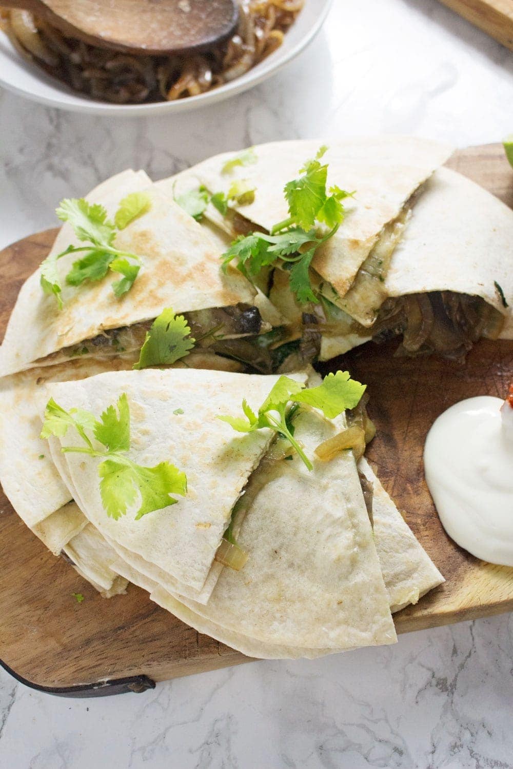 These portobello & caramelised onion quesadillas are the perfect vegetarian dinner when you're craving something full of Mexican flavour!