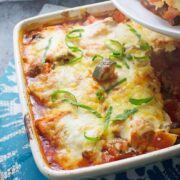 This cheesy veggie pesto polenta bake will keep you warm in winter! Bursting with veg & guaranteed to fill you up, this is the perfect vegetarian dinner.