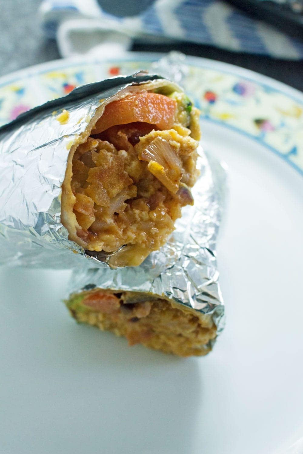 This breakfast burrito stuffed with bacon, egg and hash browns give you the perfect start to the day! They're an impressive but easy to make breakfast.