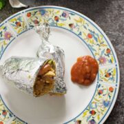 These breakfast burritos stuffed with bacon, egg and hash browns give you the perfect start to the day! They're an impressive but easy to make breakfast.