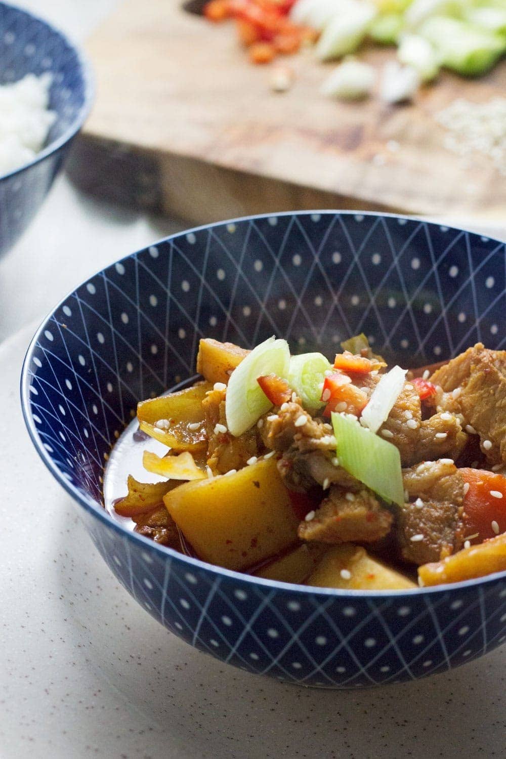This Korean pork & potato stew is full of warm, spicy flavour. Slow cooking it makes the meat fall apart. It's the perfect winter warmer.