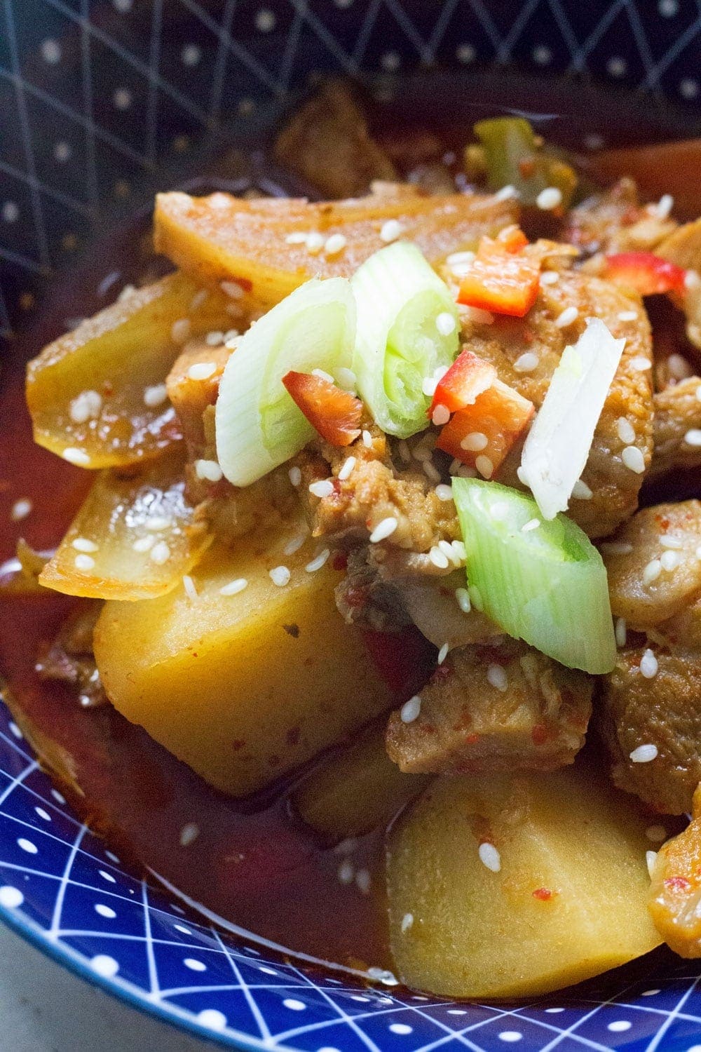 This Korean pork & potato stew is full of warm, spicy flavour. Slow cooking it makes the meat fall apart. It's the perfect winter warmer.