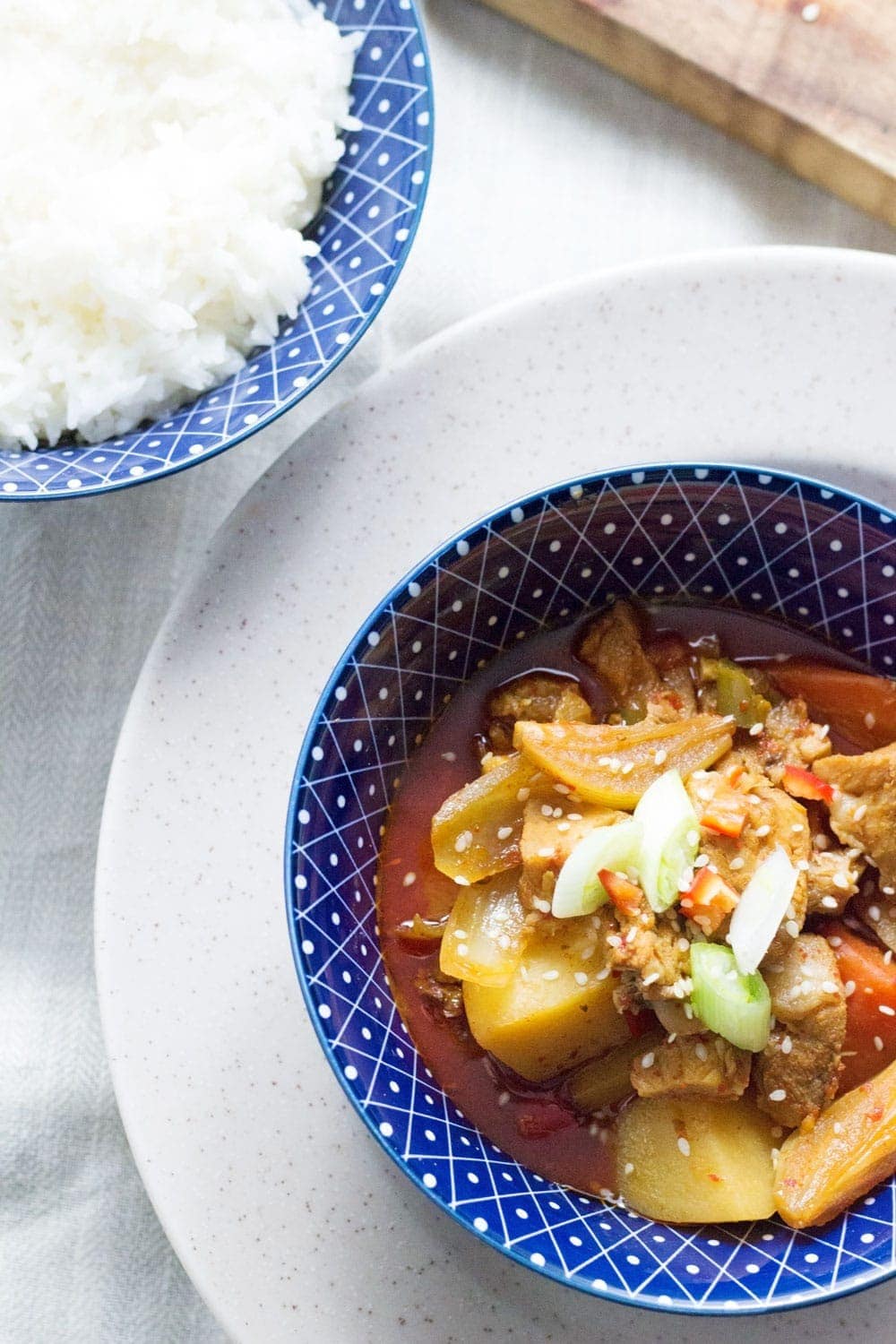 This Korean pork & potato stew is full of warm, spicy flavour. Slow cooking it makes the meat fall apart. It's the perfect winter warmer.