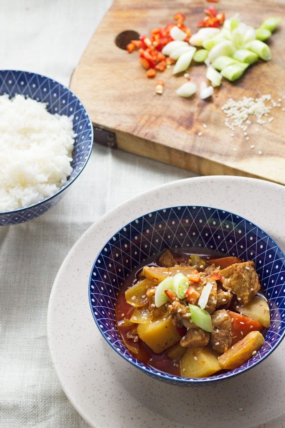 This Korean pork & potato stew is full of warm, spicy flavour. Slow cooking it makes the meat fall apart. It's the perfect winter warmer.