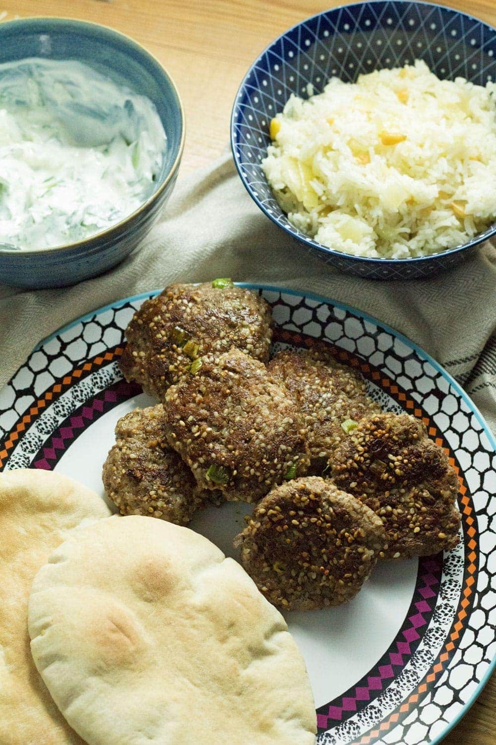 This sesame lamb recipe tastes delicious stuffed in a pitta with some cucumber and mint yoghurt drizzled on top and some pine nut rice on the side.