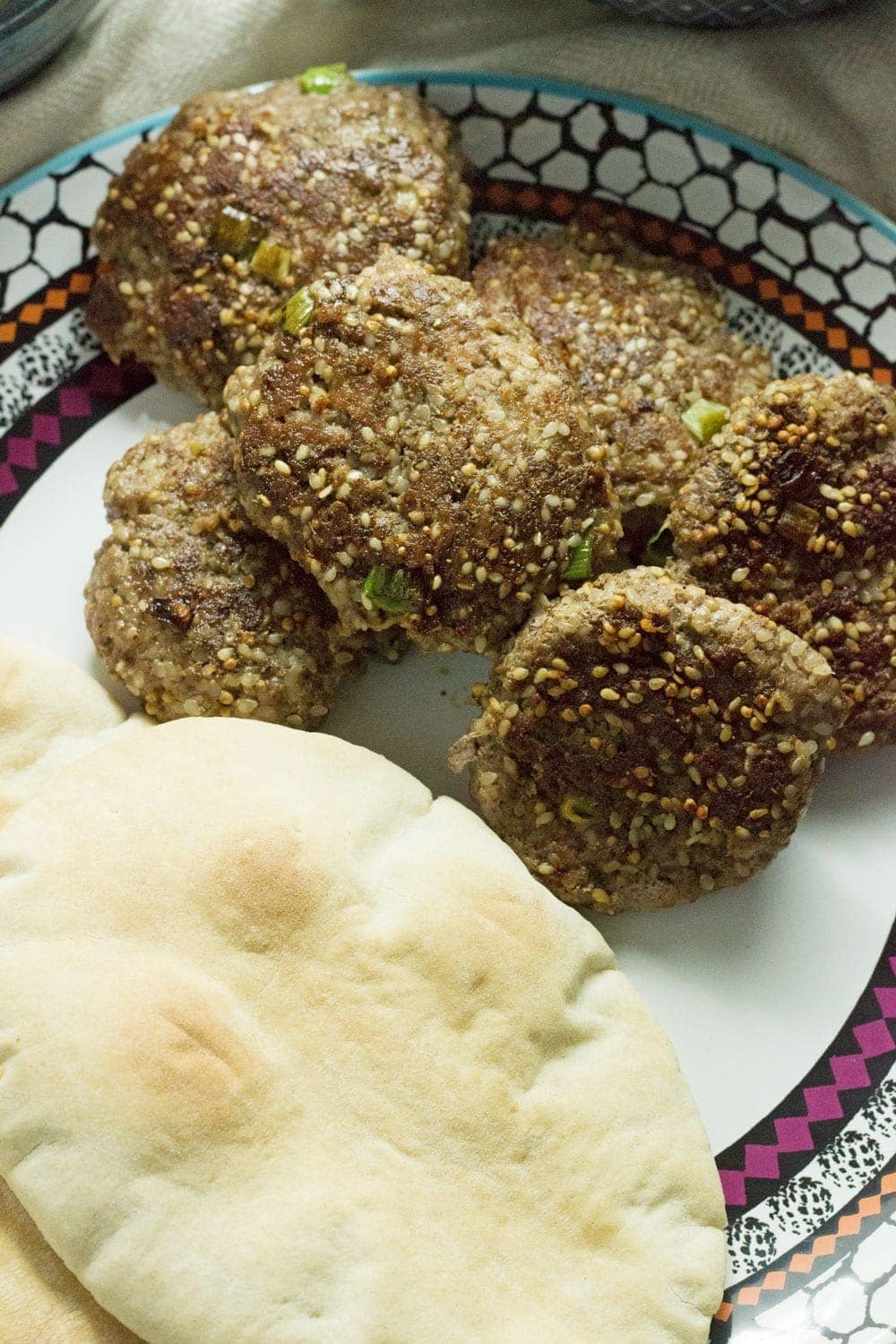 This sesame lamb recipe tastes delicious stuffed in a pitta with some cucumber and mint yoghurt drizzled on top and some pine nut rice on the side.