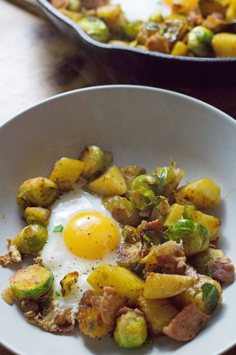 This Brussels sprout, potato & bacon breakfast hash is the perfect thing to start your morning! Crack in an egg or two & you've got a tasty morning meal.