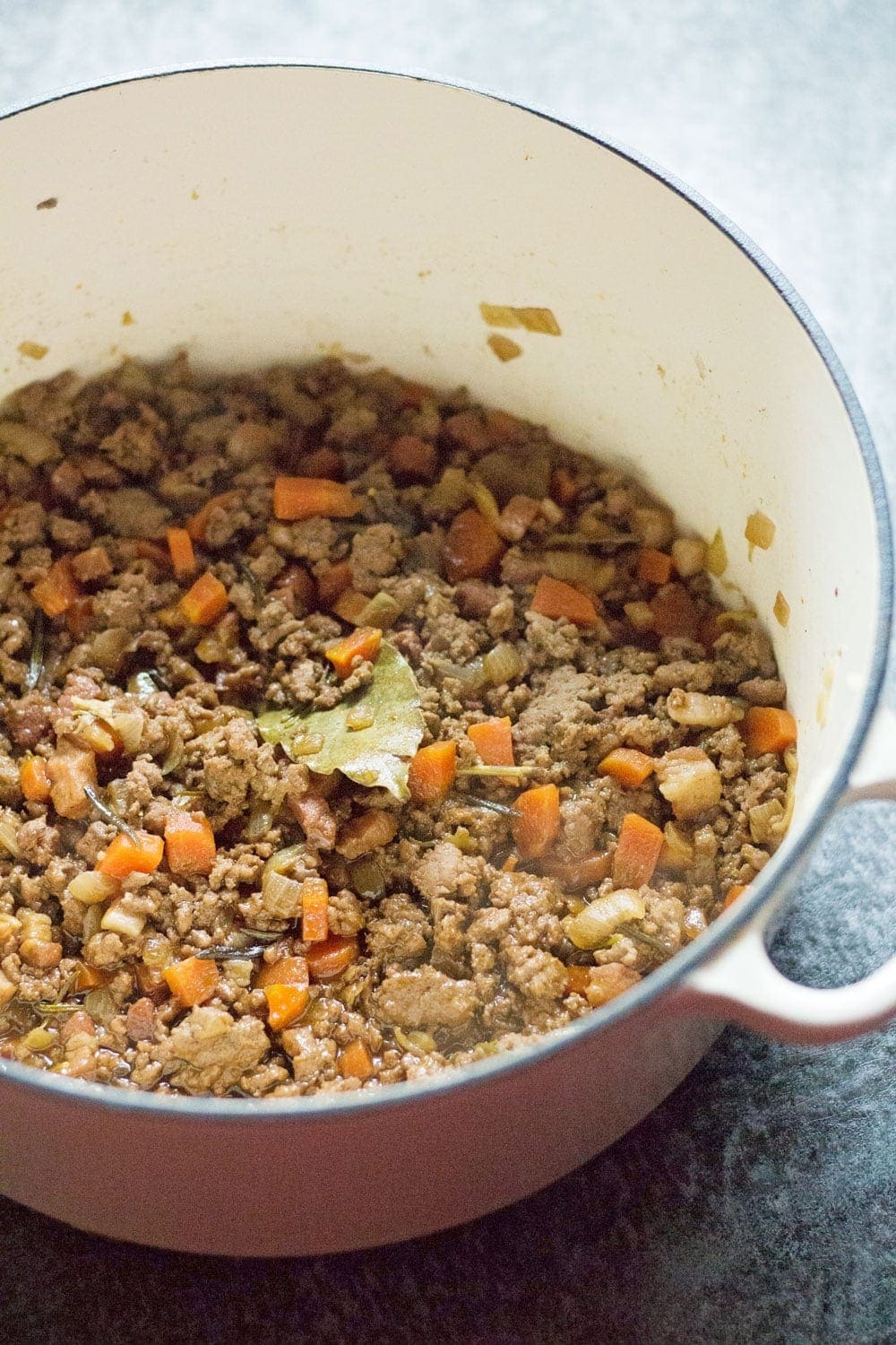 This veal & pancetta ragu is slow cooked for over an hour to get the meat insanely tender. This recipe makes a delicious change from beef.