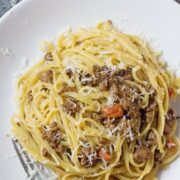 This veal & pancetta ragu is slow cooked for over an hour to get the meat insanely tender. This recipe makes a delicious change from beef.