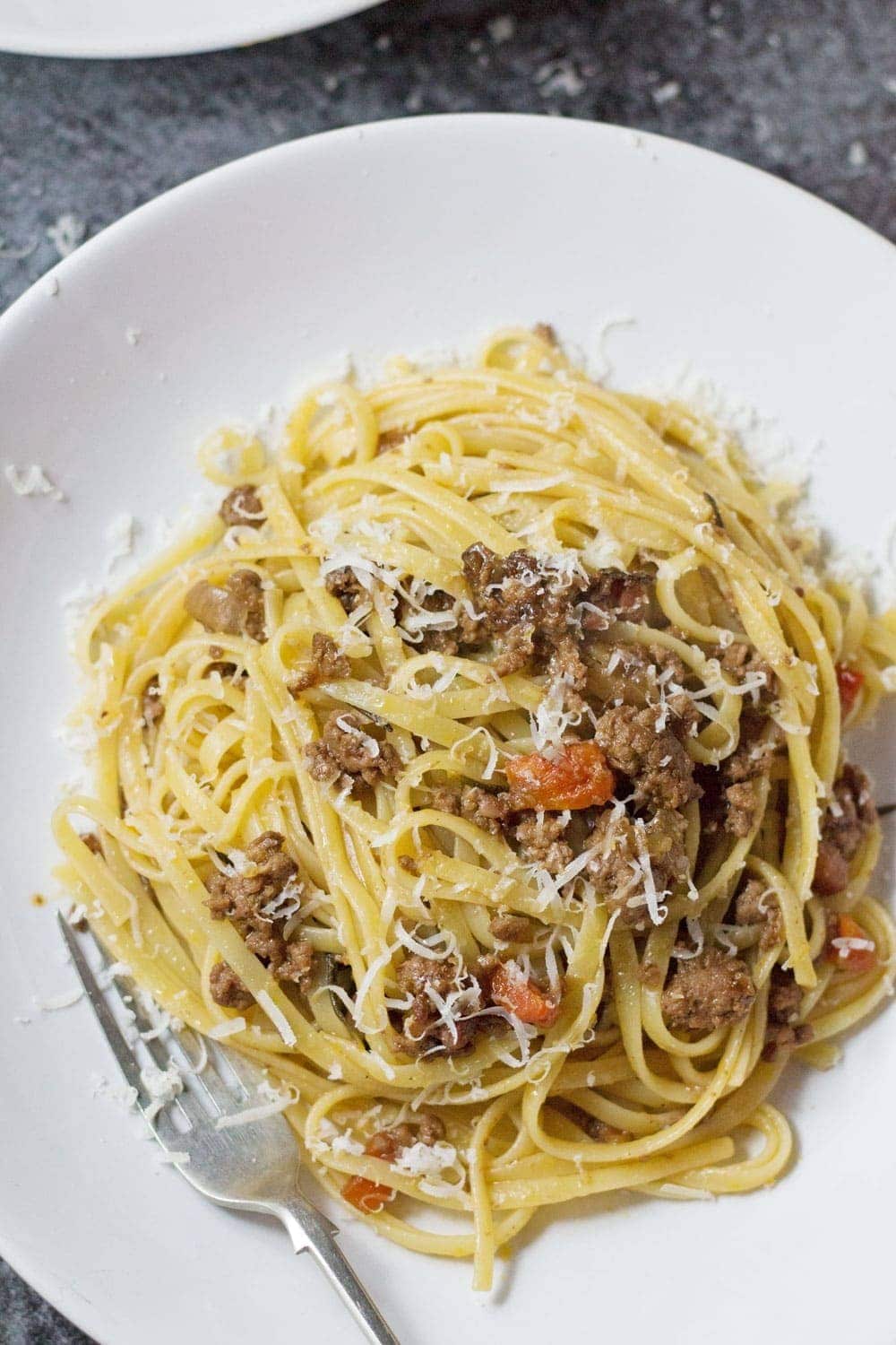 This veal & pancetta ragu is slow cooked for over an hour to get the meat insanely tender. This recipe makes a delicious change from beef.