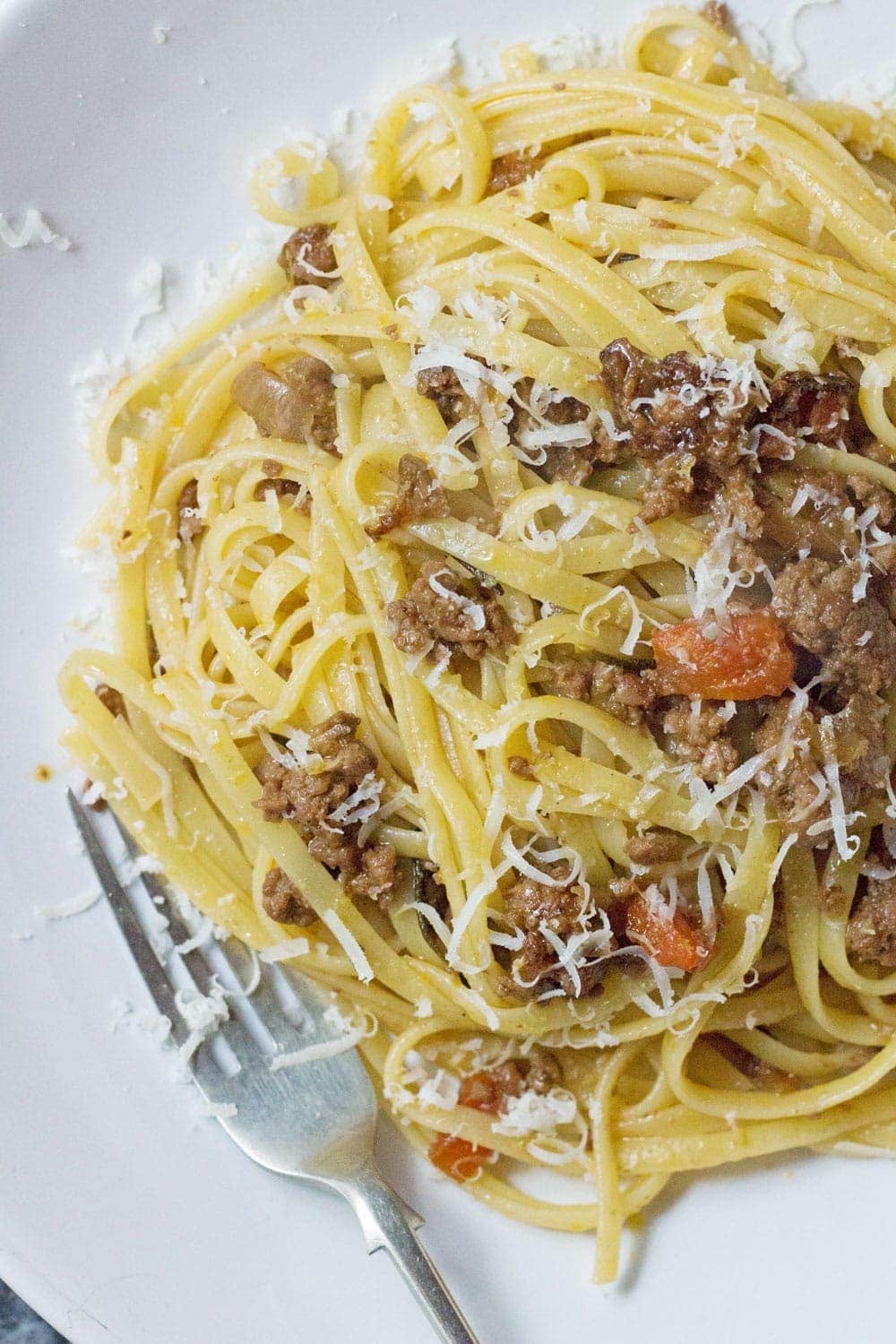 This veal & pancetta ragu is slow cooked for over an hour to get the meat insanely tender. This recipe makes a delicious change from beef.