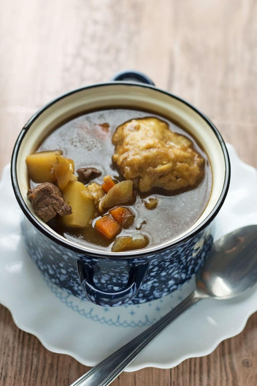 Beef vegetable soup with dumplings is super comforting & the perfect recipe for a Sunday treat. It's flavoured with rosemary & hearty from the potatoes.