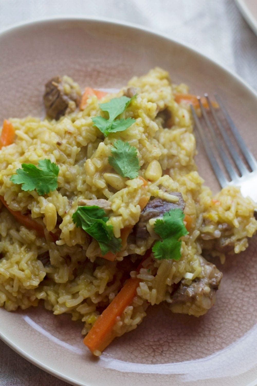 This leftover roast lamb pilaf is a great way to use up leftovers and you could easily substitute the lamb for any other cooked meat!