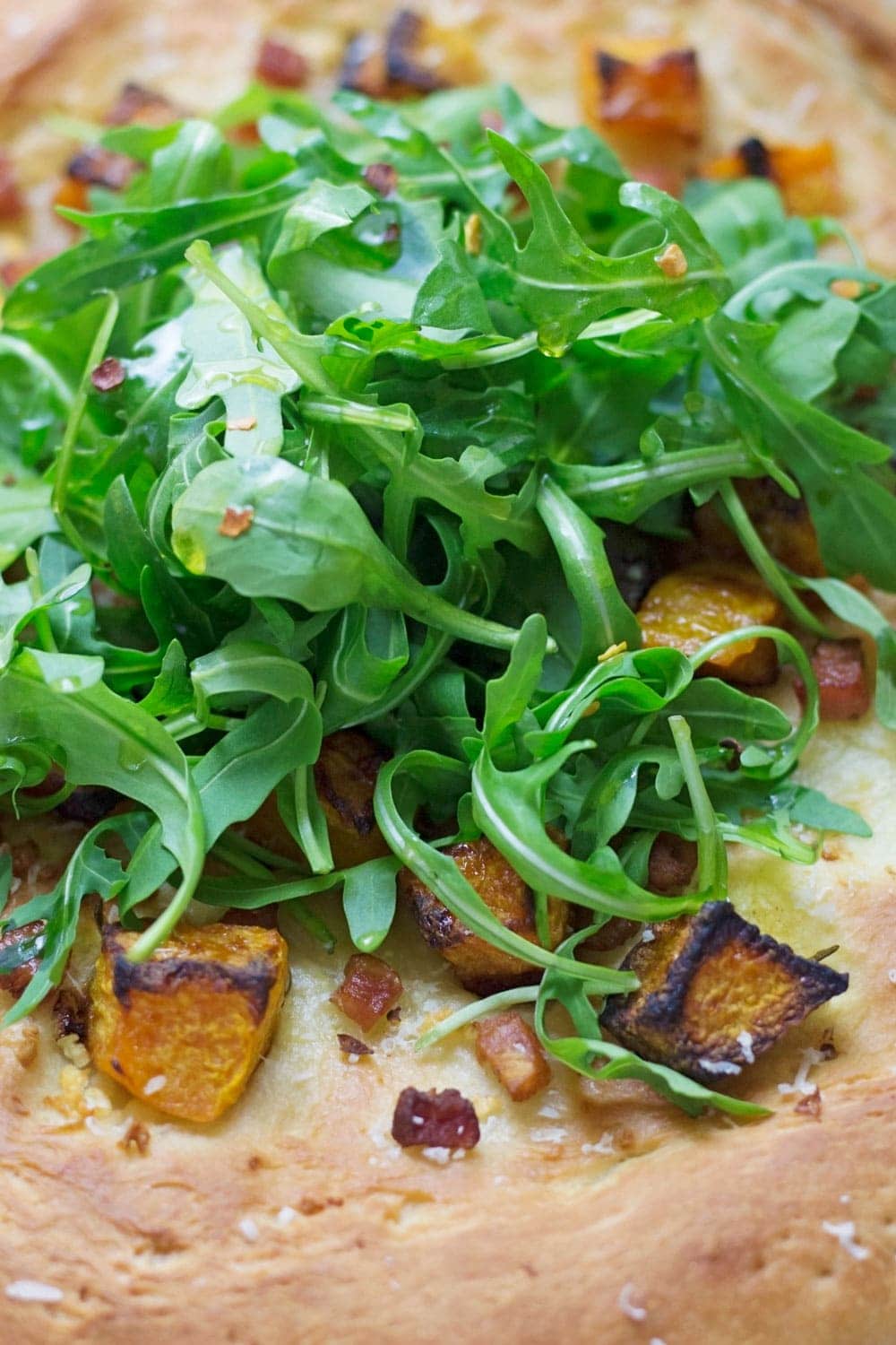 Roasted butternut squash & pancetta pizza is a tasty change from traditional pizza. The toppings are the perfect combination of sweet and salty!