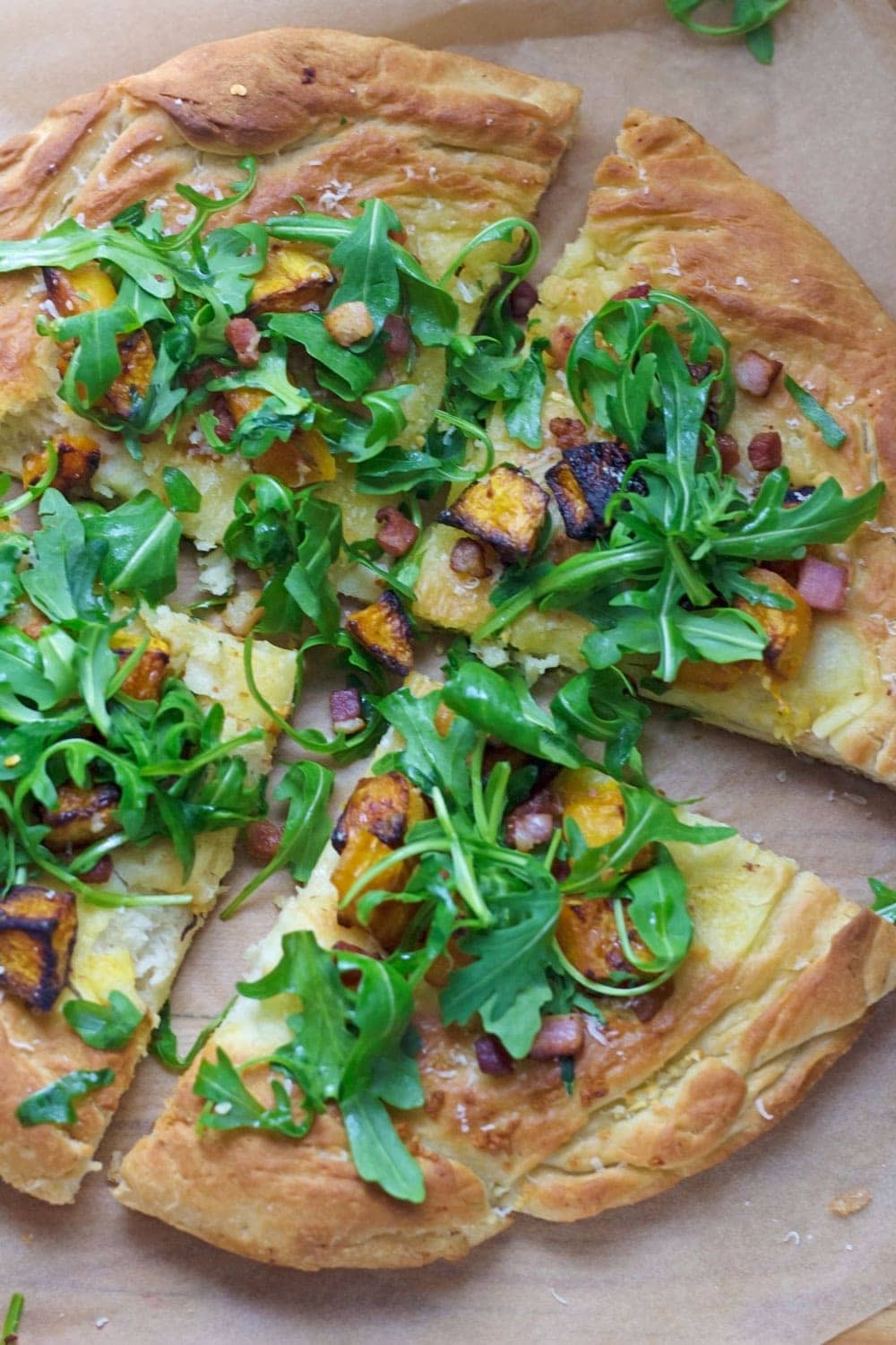 Roasted butternut squash & pancetta pizza is a tasty change from traditional pizza. The toppings are the perfect combination of sweet and salty!