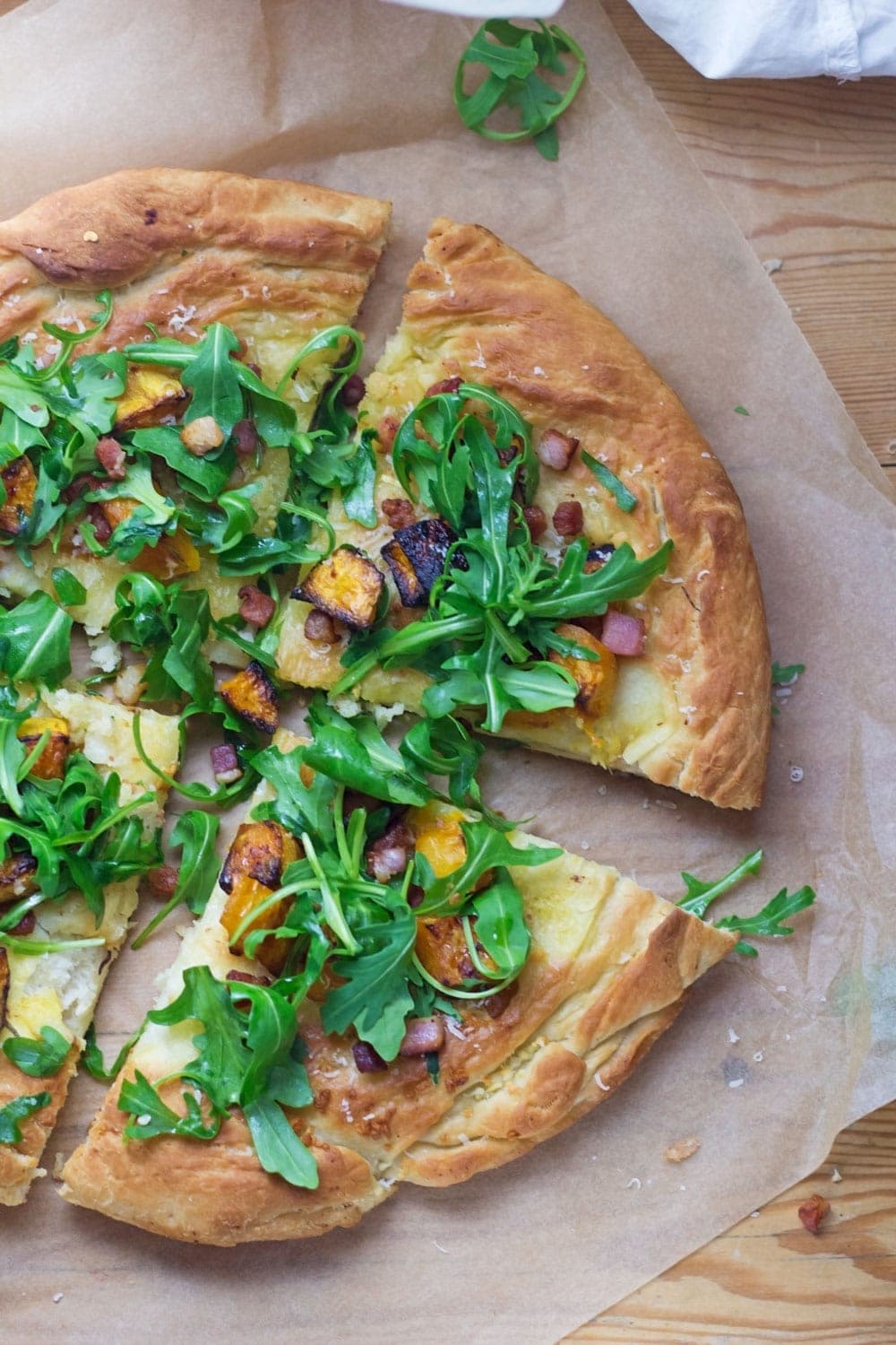 Roasted butternut squash & pancetta pizza is a tasty change from traditional pizza. The toppings are the perfect combination of sweet and salty!