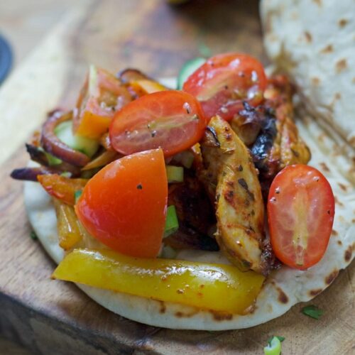 Sheet Pan Greek Chicken Flatbreads with Marinated Tomatoes and Herby