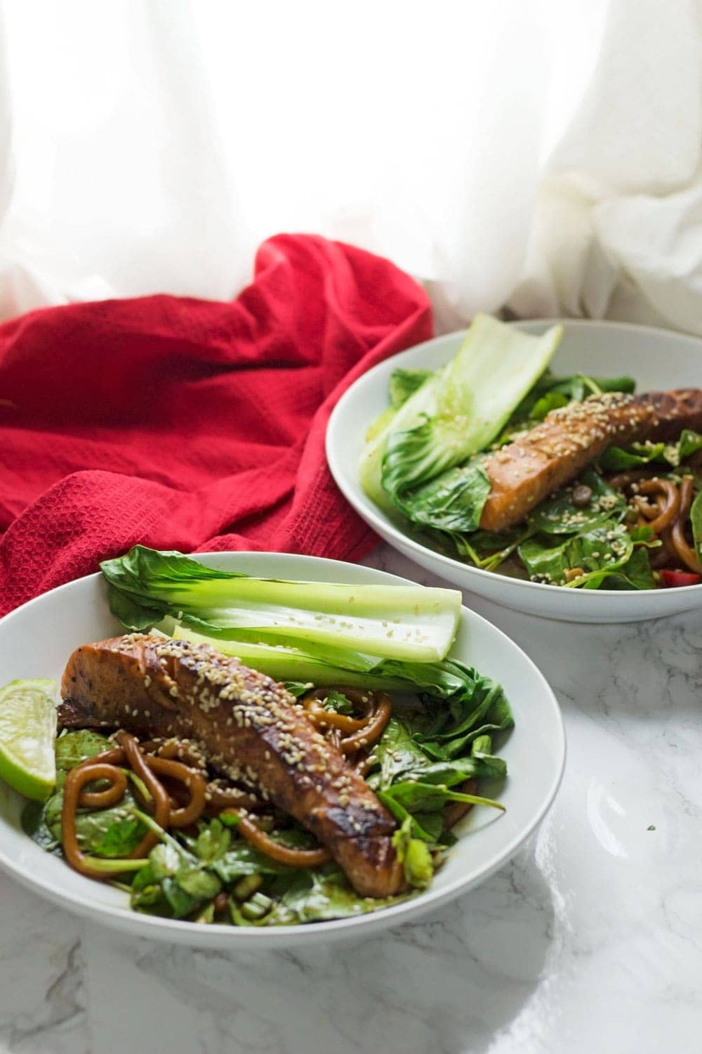 This fresh and healthy teriyaki salmon with udon noodles is a delicious summer dinner with a spicy kick. Serve with spinach and pak choi.