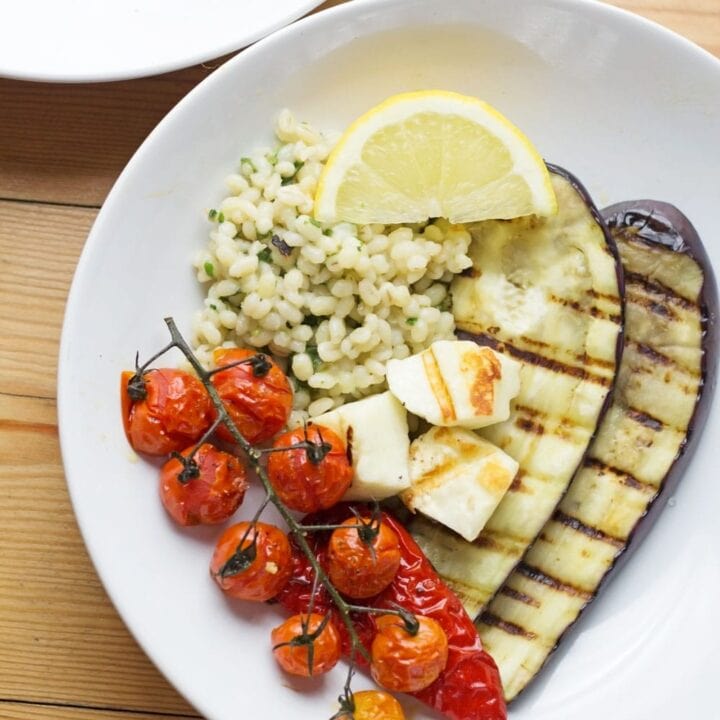 Summer dinner is here with this griddled halloumi served over herby pearl barley. Roasted veg helps to make this a really healthy and delicious meal.