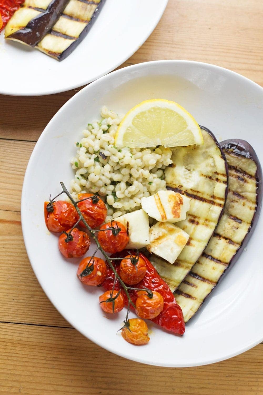 Summer dinner is here with this griddled halloumi served over herby pearl barley. Roasted veg helps to make this a really healthy and delicious meal.