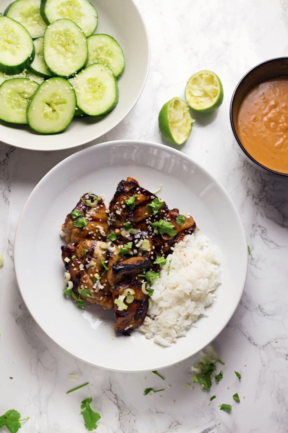 This grilled chicken with peanut sauce is served with a cooling sesame cucumber salad. The recipe requires minimal fuss and feels super indulgent!