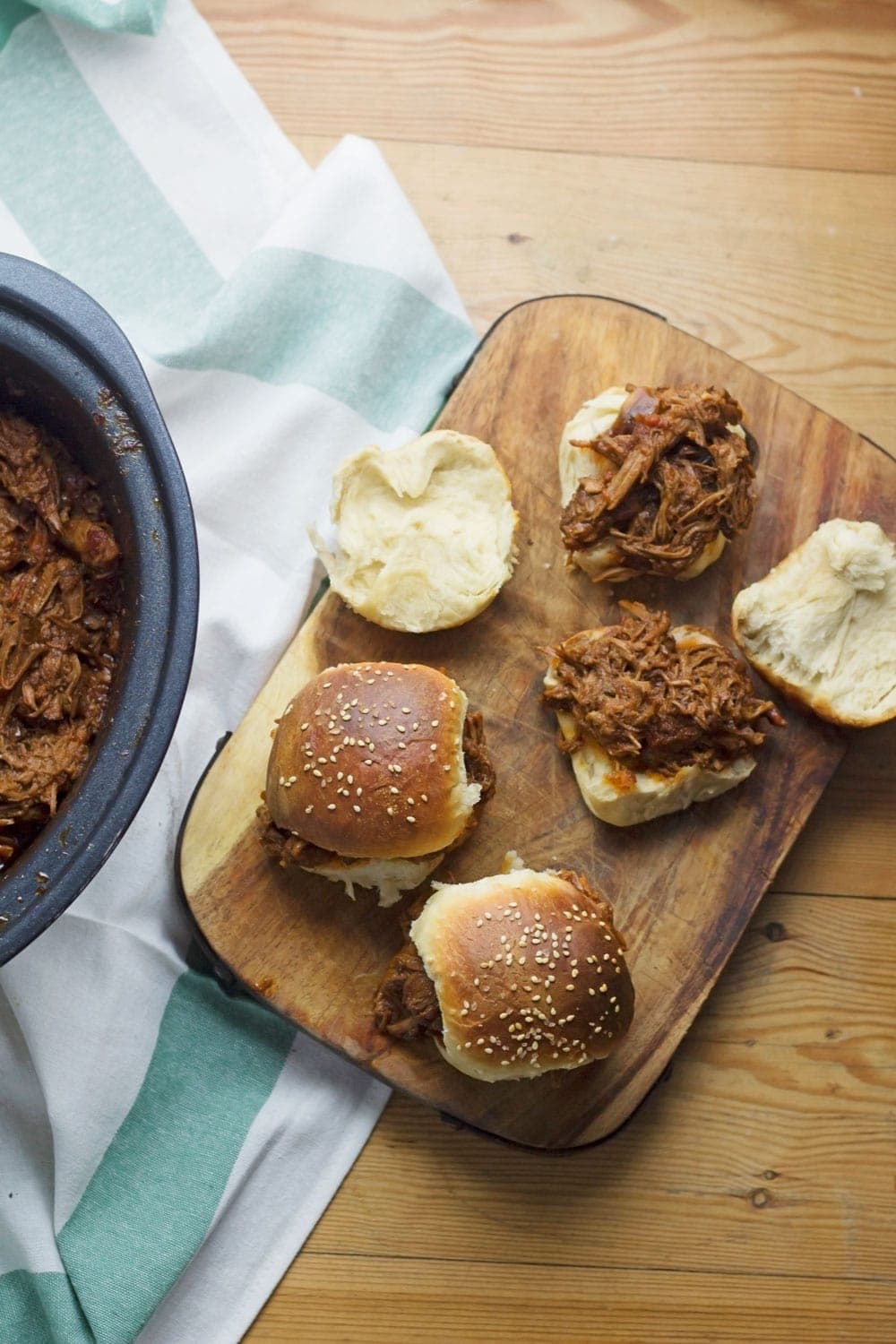 Beef brisket is slow cooked until meltingly tender for this spicy slow cooker pulled brisket. Serve in rolls or wraps for a delicious dinner!