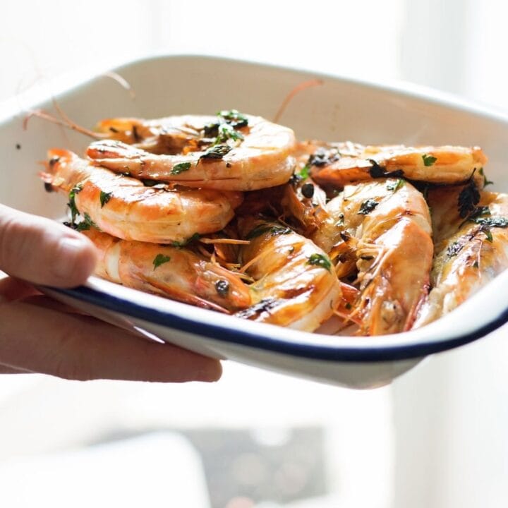 This chilli & garlic prawns recipe is the perfect thing to serve at a summer dinner party! It's quick, simple and is guaranteed to impress.