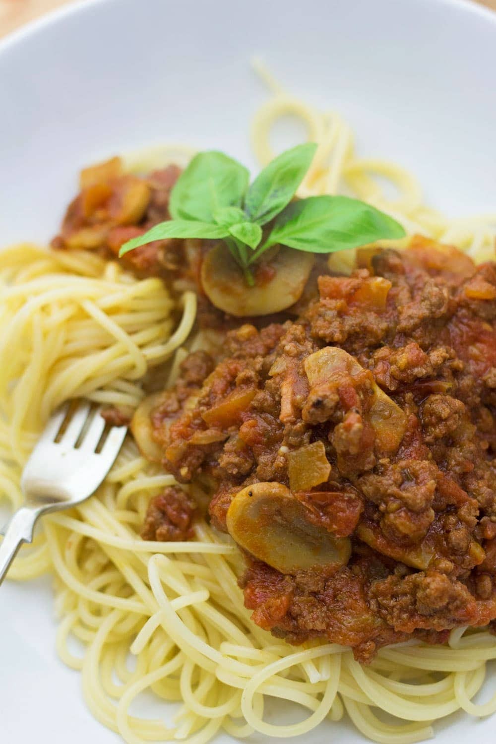 This beef, bacon and mushroom ragu is easy, tasty and the perfect comfort food. Serve on top of spaghetti with a shaving of parmesan.