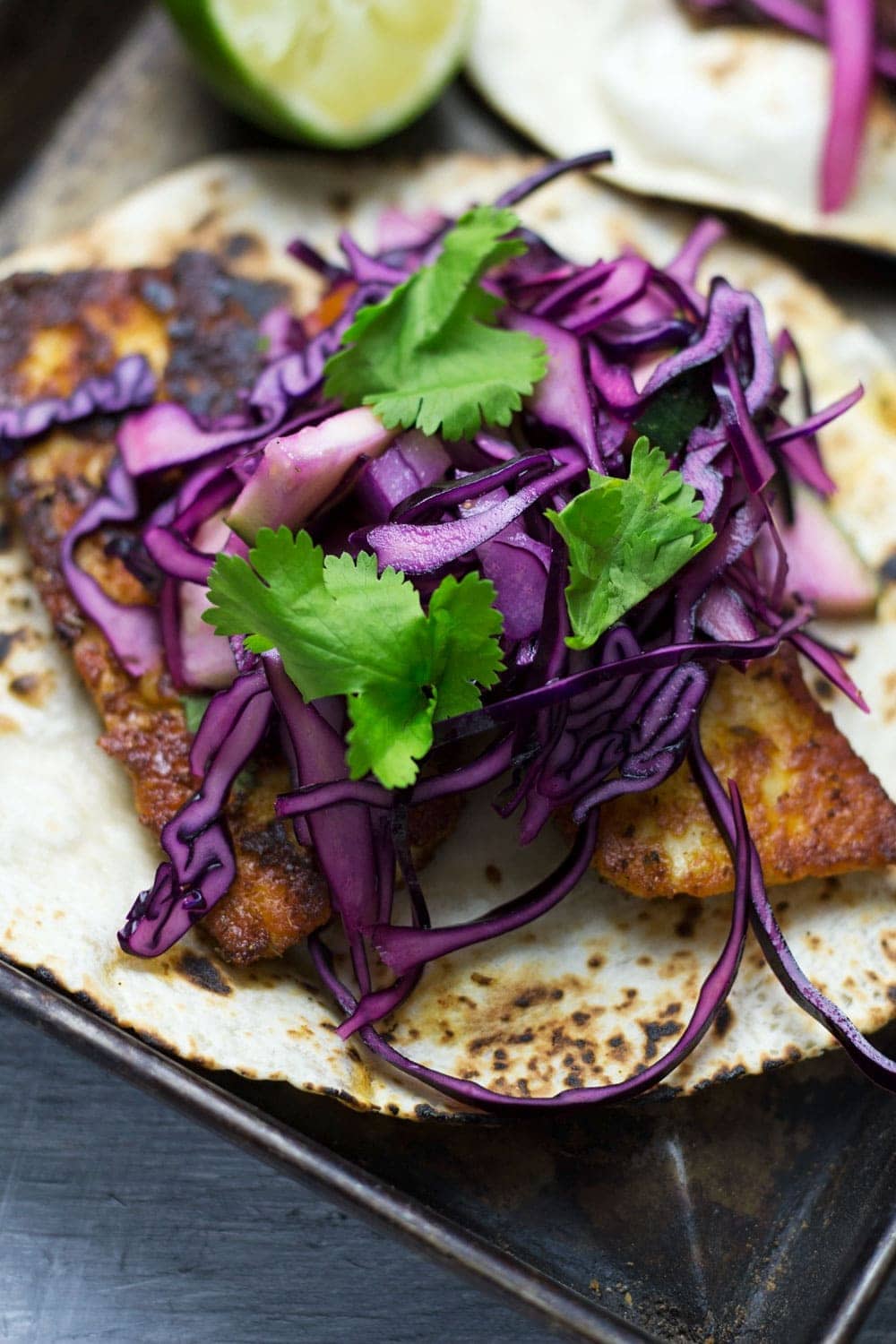 Close up of halloumi taco with slaw