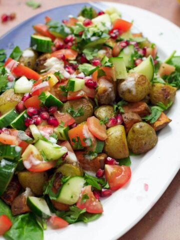 Forget about your boring old potato salad, this roast potato salad recipe uses normal & sweet potatoes with a sumac yoghurt dressing to make a tasty dinner!