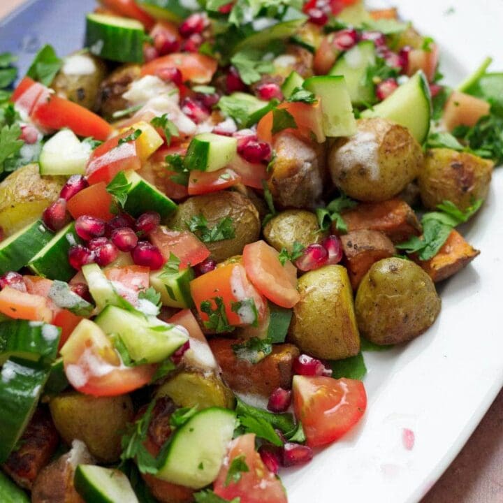 Forget about your boring old potato salad, this roast potato salad recipe uses normal & sweet potatoes with a sumac yoghurt dressing to make a tasty dinner!