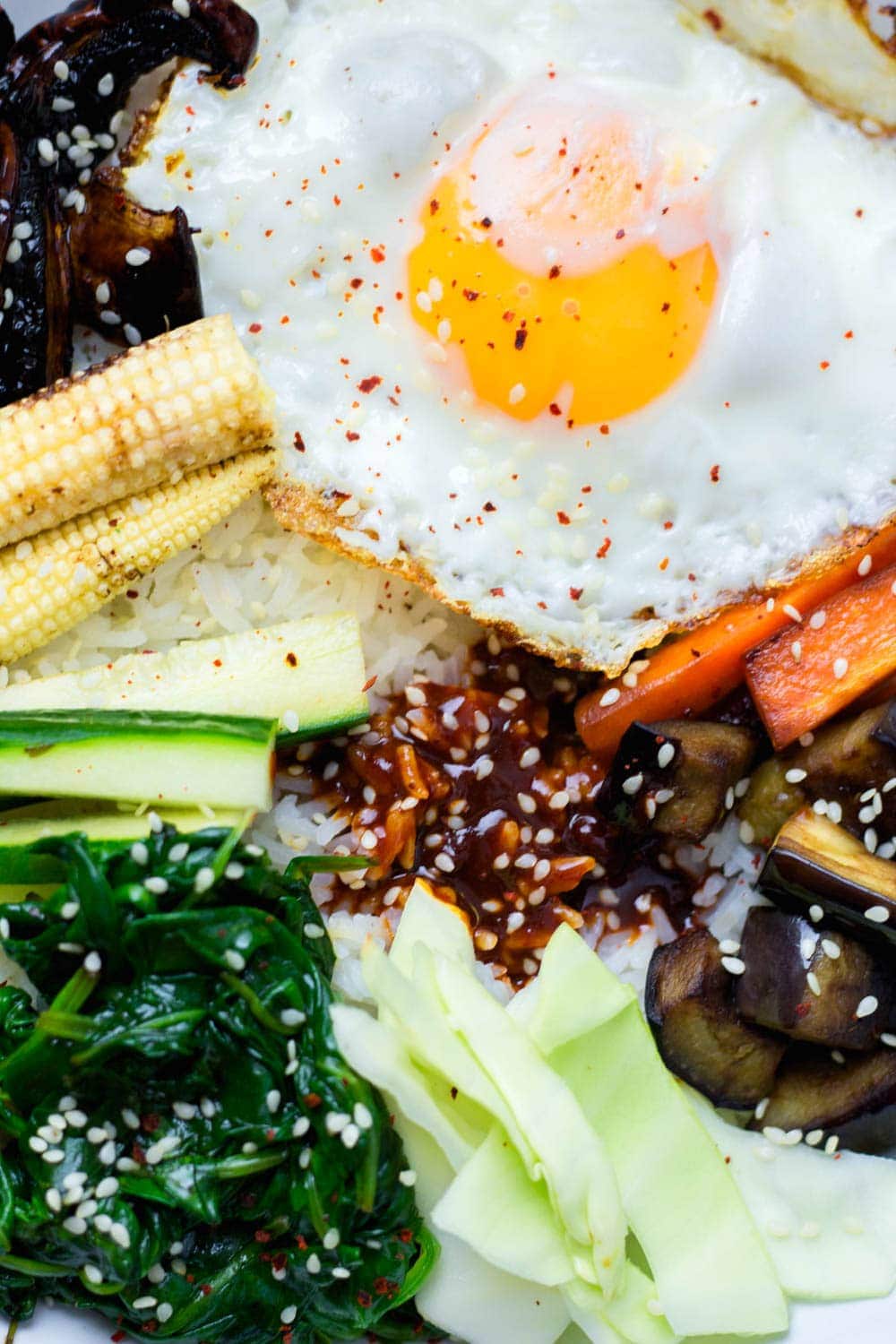 It's so easy to make this vegetable bibimbap and there's so many different ways you can make it your own! Don't forget the crispy fried egg & chilli sauce.