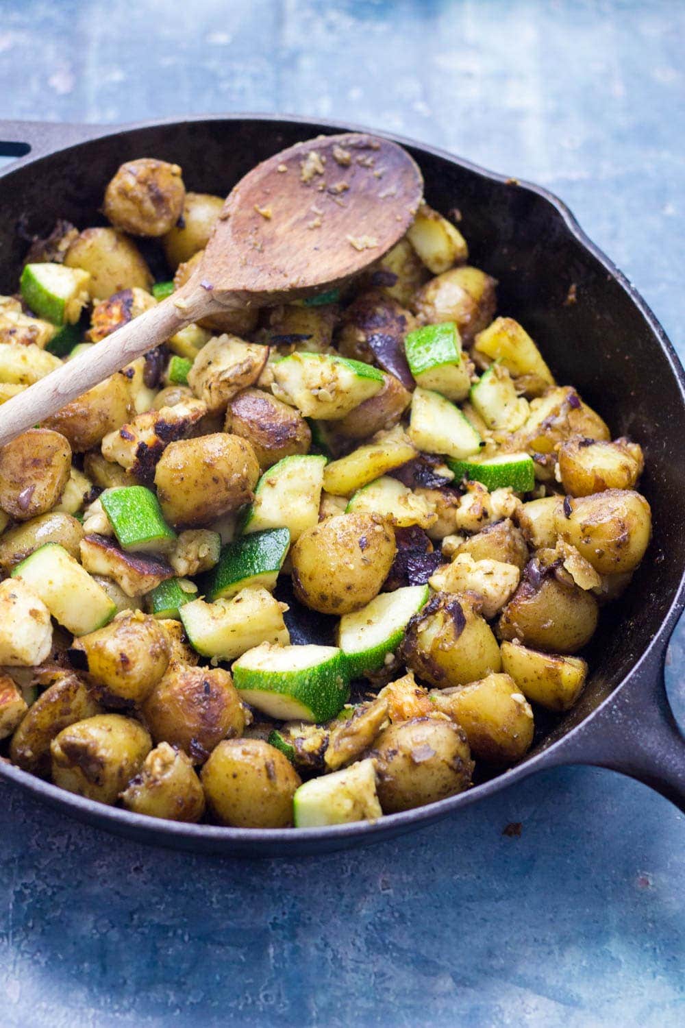 I love this potato, courgette & halloumi hash for breakfast, lunch or dinner! Topped with an easy tomato sauce & a poached egg it's a guaranteed winner.